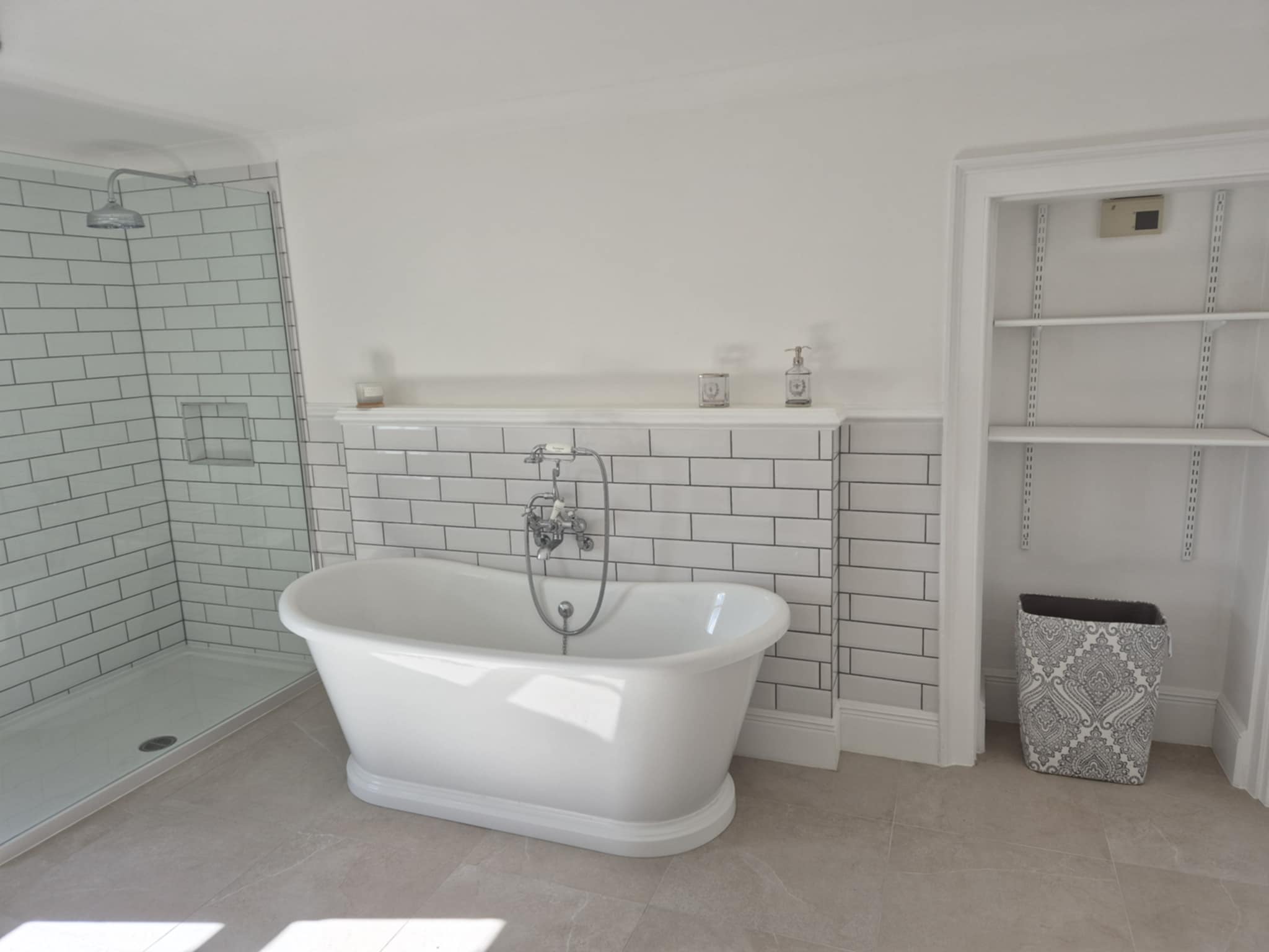 Classic bathroom with subway tiles and freestanding tub